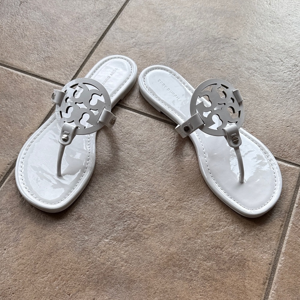 Tory Burch White Patent Logo Thong Sandals with Silver Logo Medallions